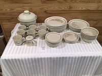 Entire 46-piece dinnerware set displayed on table