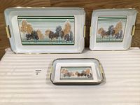 Three trays displayed to show sizes and design