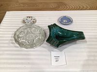 Top view of the four ashtrays showing colours, shapes and materials