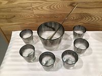 Smoky gray punch bowl, six tumblers, clear stir stick displayed