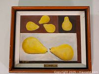 Front view of framed painting showing composition of yellow pears on brown and white backgrounds and frame.