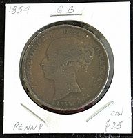 Obverse side of the 1854 Queen Victoria one penny coin showing Queen Victoria's profile.
