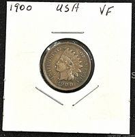 Front (obverse) view of the 1900 US Indian Head penny, showing the bust of Liberty wearing a Native American headdress with the inscription 'UNITED STATES OF AMERICA' and the year 1900.