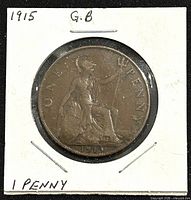 Reverse of the 1915 King George V one penny coin showing seated Britannia with trident and shield, denomination and year.
