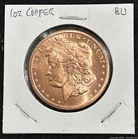 Front side of the 1 oz copper round coin showing obverse Morgan Dollar design with Liberty head and stars