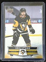 Front view of the Kris Letang hockey card from 2021-22 Tim Hortons Upper Deck series showing Letang in Penguins uniform.