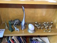 Shelf display of all items showing arrangement and size relation