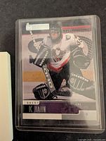 Front of Brent K Rahn Upper Deck hockey card showing him as a goalie in uniform.