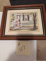 Full view of the framed print showing the girl with umbrella scene by Trish Romance.