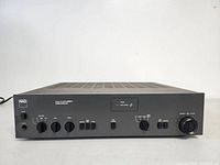 Front view of amplifier powered off, showing controls and overall condition