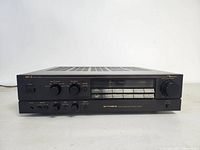 Front left angle view showing tuner display, controls and overall cosmetic condition