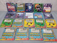 Full view of all game discs and covers laid out showing titles and colorful artwork.