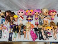 Wide group view showing assortment of 22 dolls including several Lalaloopsy dolls and various fashion dolls