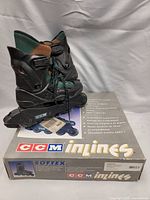 Photo of black CCM soft inline skates placed on the original CCM inline skates box, showcasing the skates and box details.