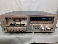 Front view showing cassette compartment, control buttons and display