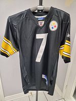 Front view of black Pittsburgh Steelers NFL jersey with number 7 on front, yellow and white stripes on sleeves.