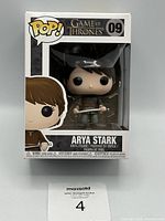 Front view of the Funko POP Arya Stark figure in box, showing the figure and packaging details.