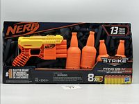 Full view of the packaged Nerf Alpha Strike FANG QS-4 Targeting Set showing blaster, darts, and target bottles in package.