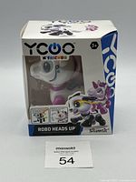 Front view of boxed YCOO Robo Heads Up Unicorn robotic pet showing branding, age recommendation, and illustrations of toy.