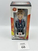 Front view of Wayne Gretzky Team Canada bobblehead in original packaging with clear window showing figure and medal.