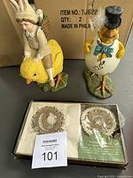 Two Bethany Lowe Easter figurines and vintage Hallmark Thanksgiving napkins and coaster set in original box.