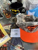 Photos of detailed Star Wars tall drinking glasses, showing character graphics, and a Batman coffee mug in background.