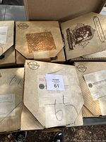 Six sealed original boxes containing Bradford Exchange Knowles Gone With the Wind collector plates in a larger shipping box.