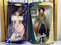 Both Barbie dolls in their original boxes showing overall packaging condition and display of dolls
