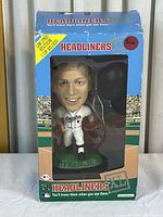 Full front view of the boxed Cal Ripken Jr. figurine in Baltimore Orioles uniform, showing limited edition sticker and condition of the box.