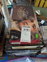 Top view showing John Company board game box with label and surrounding games.