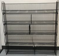 Front view of the 5-tier black metal wire organizer shelf showing its full height and width with five shelves and wire construction.