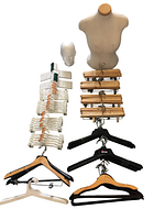 Overall view of female torso mannequin, Ashland foam male head, and mixed hangers arranged neatly for display.