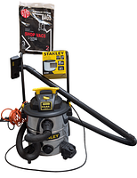 Front view of Stanley SL18158 wet/dry vacuum cleaner with hose attached, boxed Stanley cartridge filter placed on cart, and two new vacuum bags displayed on top.