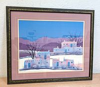 Front view of the framed lithograph print showing the Southwest adobe homes scene with signature and frame detail.