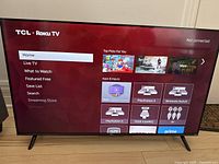 Front view powered on showing Roku home screen