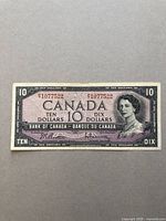 Front view of the 1954 series $10 Canadian bank note showing the serial number, Queen Elizabeth II portrait, and denomination.