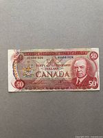 Front of the 1975 Series $50 Canadian bank note with HB prefix, showing the portrait of William Lyon Mackenzie King, serial number HB4081024, and detailed engravings.