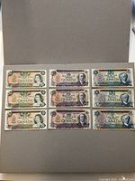 Overview of nine Canadian banknotes laid out: three $20, three $10, three $5 notes.