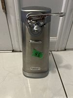 Front view of Cuisinart stainless steel electric can opener with manual lever