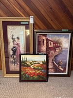 Three framed artworks shown together: two prints and one canvas painting