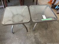 Two square outdoor tables with textured glass tops and curved metal legs shown from above and front.