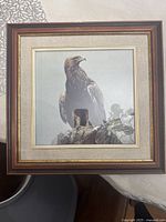 Front view of framed golden eagle artwork showing full piece and frame details.