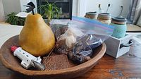 Overall lot with bowl, pear, night light, pine cones, coaster, jars in caddy