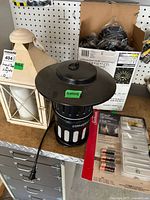 Group shot showing Dynatrap, lantern, boxed pathway lights, packaged wall lights