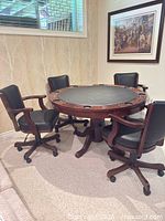 Full view of poker table with four matching chairs