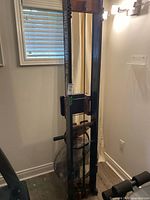 Full view of WaterRower Club machine standing upright