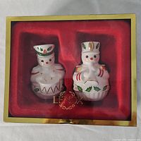 Lenox salt and pepper shakers shaped as toy soldiers in original Lenox box with red protective foam insert.