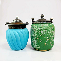 Front view of both biscuit jars with lids on