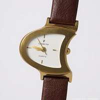 Front view showing case shape, dial and strap