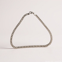 Full view of sterling silver chain standing upright